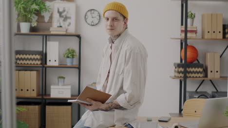 young man in home office