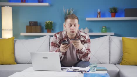 home office worker man shopping on the phone.