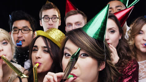 Multi-ethnic-group-of-people-celebrating-birthday-party-slow-motion-photo-booth