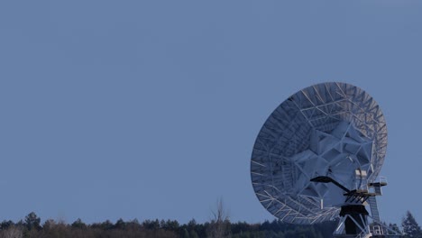 3D-animation-showing-a-large-antenna-dish-moving-to-track-a-satellite