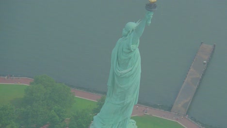 helicopter aerial of the statue of liberty in new york city 4