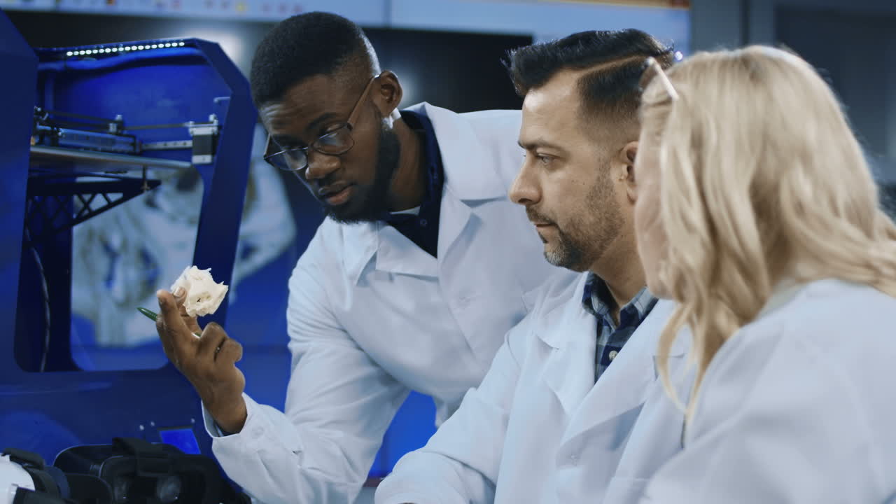 Scientists Discussing 3D Printed Model in a Laboratory