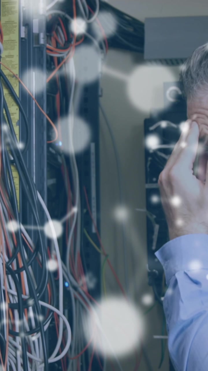 Animation of molecules over stressed caucasian man standing at servers