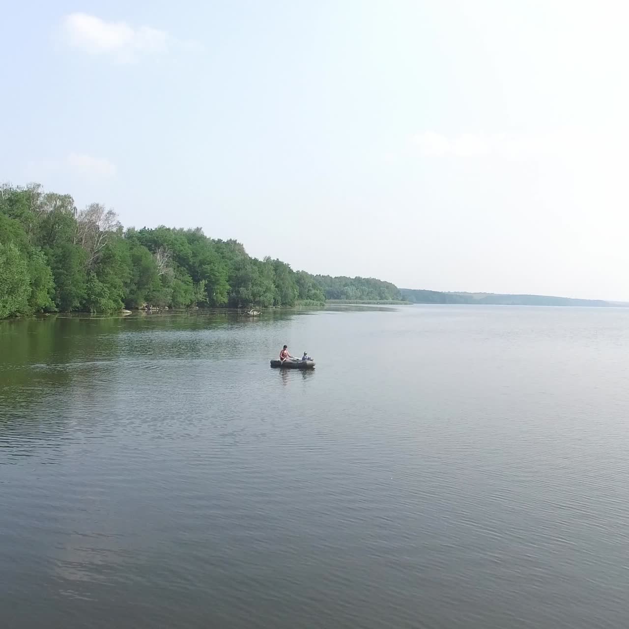 Woman And Boy In The Boat