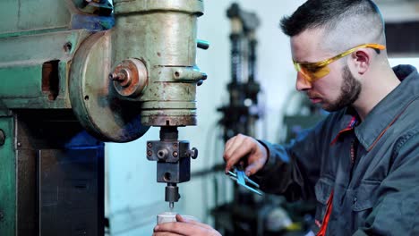 factory worker at industrial facilities. industrial machine operator working in factory