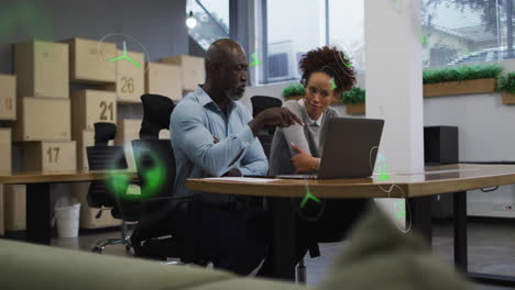 discussing work, colleagues using laptop with green eco-friendly animation overlay