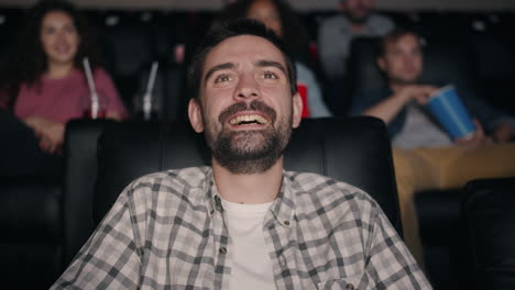 man enjoying movie at the theater