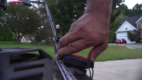 tightening a lawn mower cap