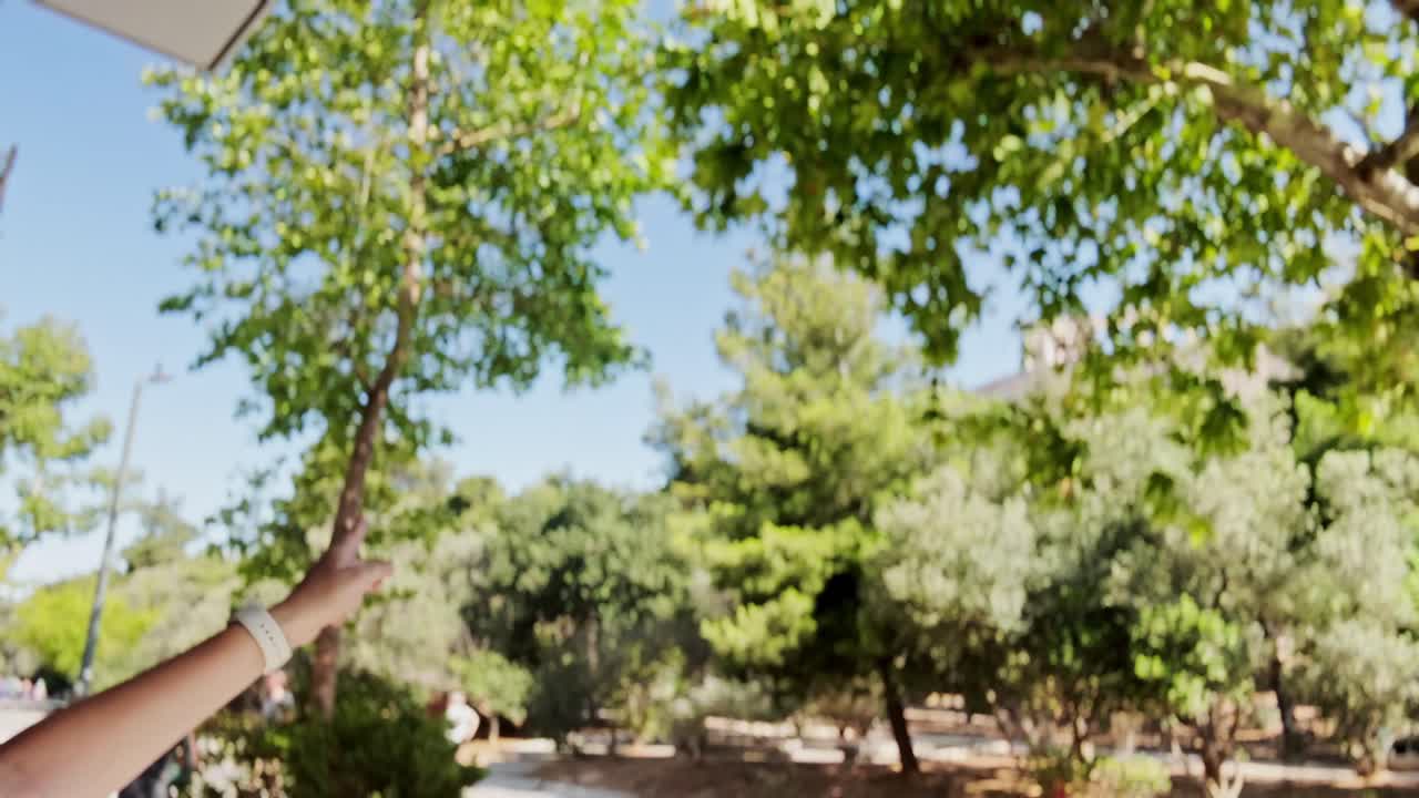 Stylish Woman with Sunglasses Vlogging in Athens