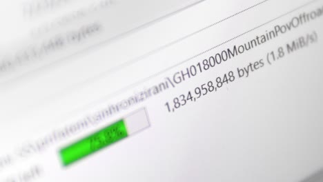 FTP file upload download, upload green progress bar with speed indicator on the screen, selective focus