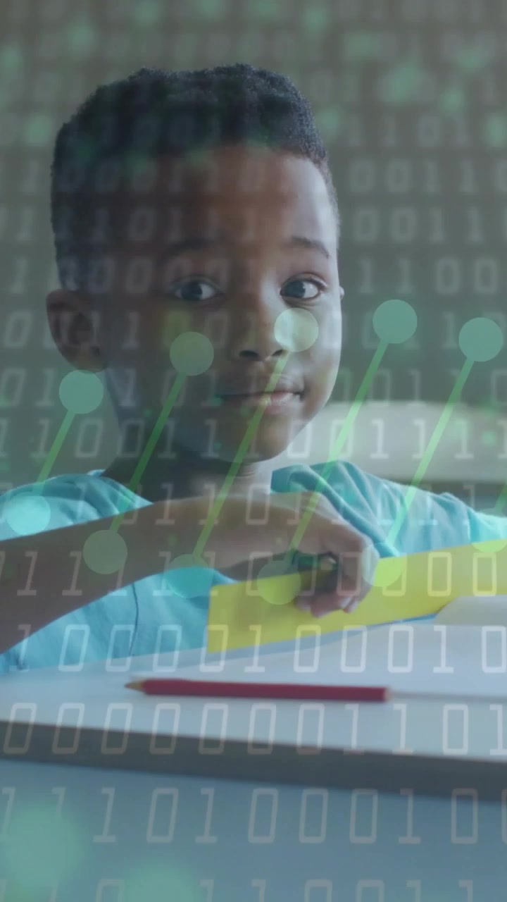 Vertical video: Boy holding green pencil, picking yellow card, solving lesson under binary edtech