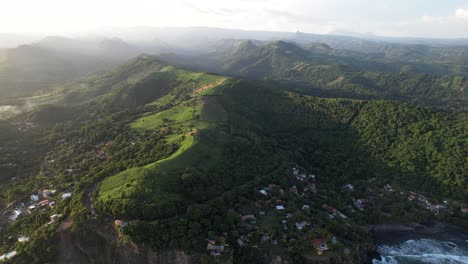 picturesque view of cliffs and lush green hills