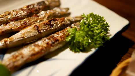 delicious grilled fish served with fresh greens