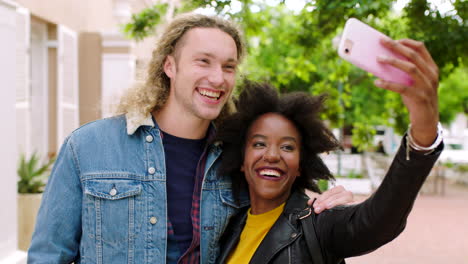 edgy friends bonding, taking selfies using a phone