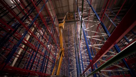 big and modern warehouse under construction, featuring metal shelving and other industrial equipment.