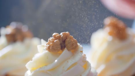 decorated cupcakes with walnuts and sprinkles