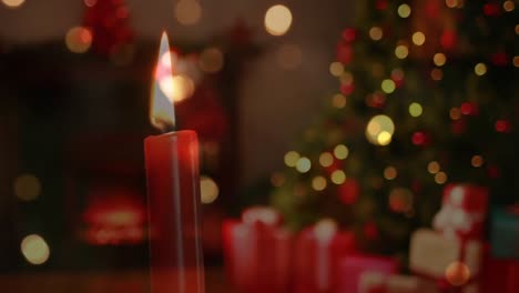 Animation-of-candle-and-christmas-tree-with-fairy-lights