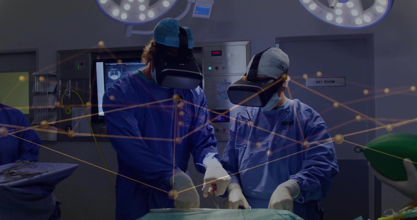 AR overlay appearing, two surgeons leaning, pointing and manipulating instruments, guiding surgery