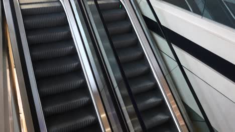 two escalators going up