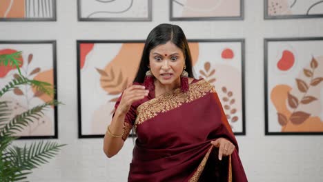 Indian-woman-scolding-someone-happily