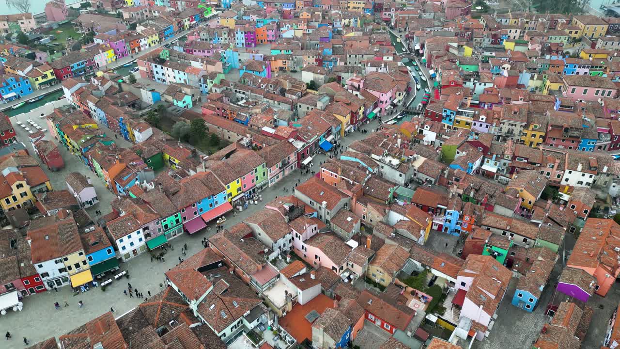 Aerial Tilt Of Island of Burano On A Foggy Day.