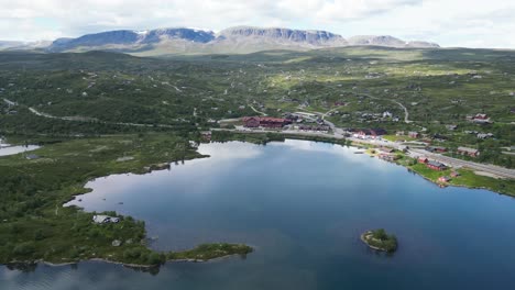 geilo town, ustedalsfjorden and winter sport ski area during summer in viken, norway - aerial circling