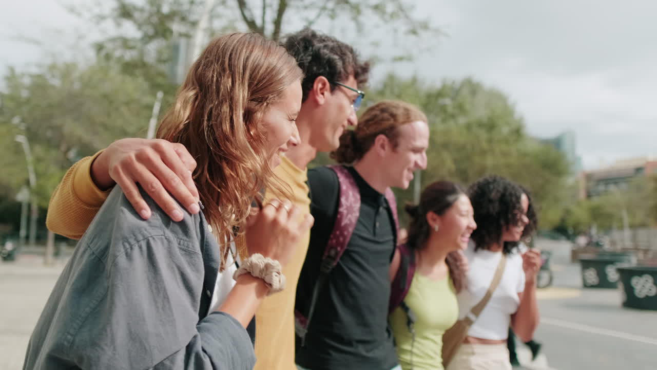 Side view of diverse group of interracial students walking, friendship and