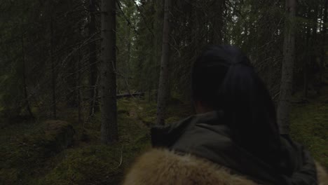 Girl-walking-in-a-mystical-forest.-Slowmotion