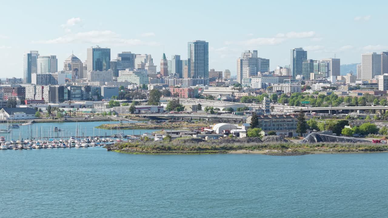 Panning aerial survey of Oakland’s bustling Jack London Square and Port Area filmed in real time in 4K.