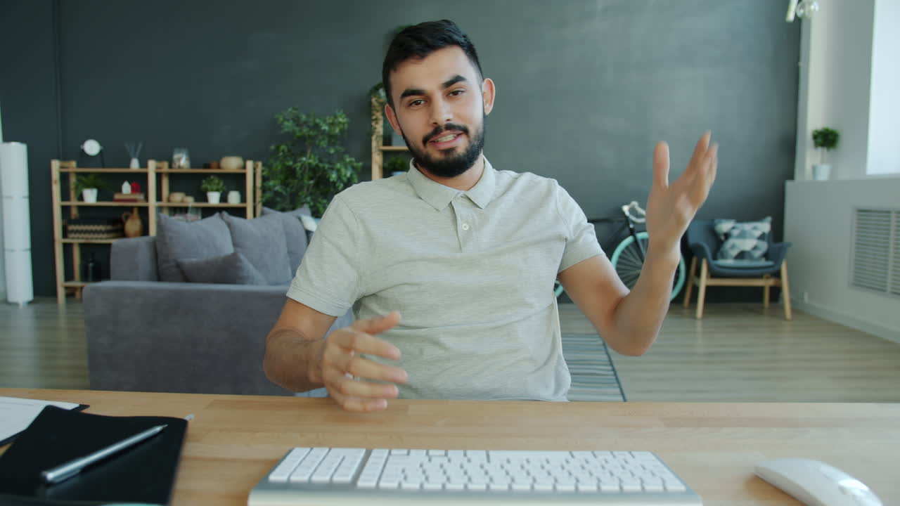Man Giving a Video Presentation in a Home Office