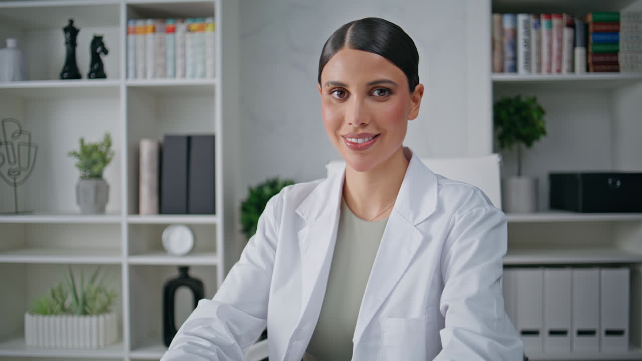 Professional physician working computer in modern hospital office closeup
