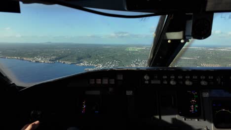 aerial view from airplane cockpit: stunning coastal scenery