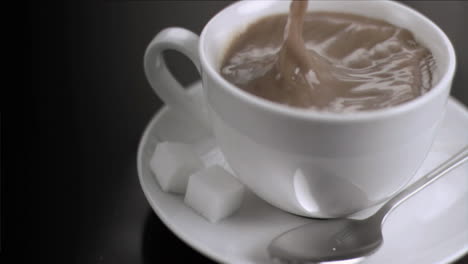 Sugar-cube-falling-in-super-slow-motion