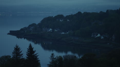 coastal town by the sea in low evening light. rural village