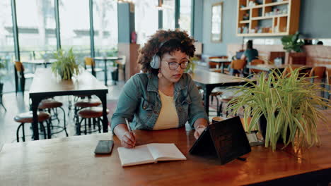 Tablet,-video-call-and-writing-with-a-black-woman