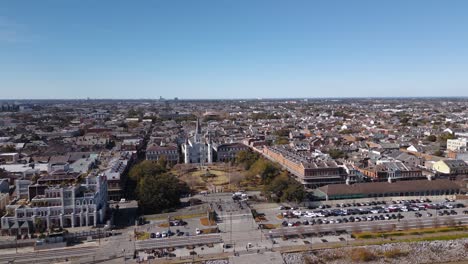 A-bustling-urban-landscape,-captured-from-above,-showcasing-a-vibrant-cityscape-with-towering-buildings,-lush-green-parks,-and-charming-suburban-homes-nestled-beneath-the-expansive-sky