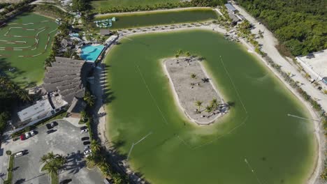 caribbean lake park, punta cana, dominican republic. aerial top-down orbiting