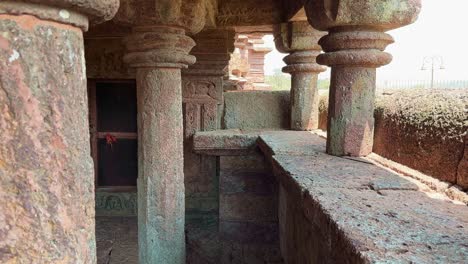 camera going through the old stone pillers in the the ancient temples of the kalachuri period in amarkantak from the 11th century