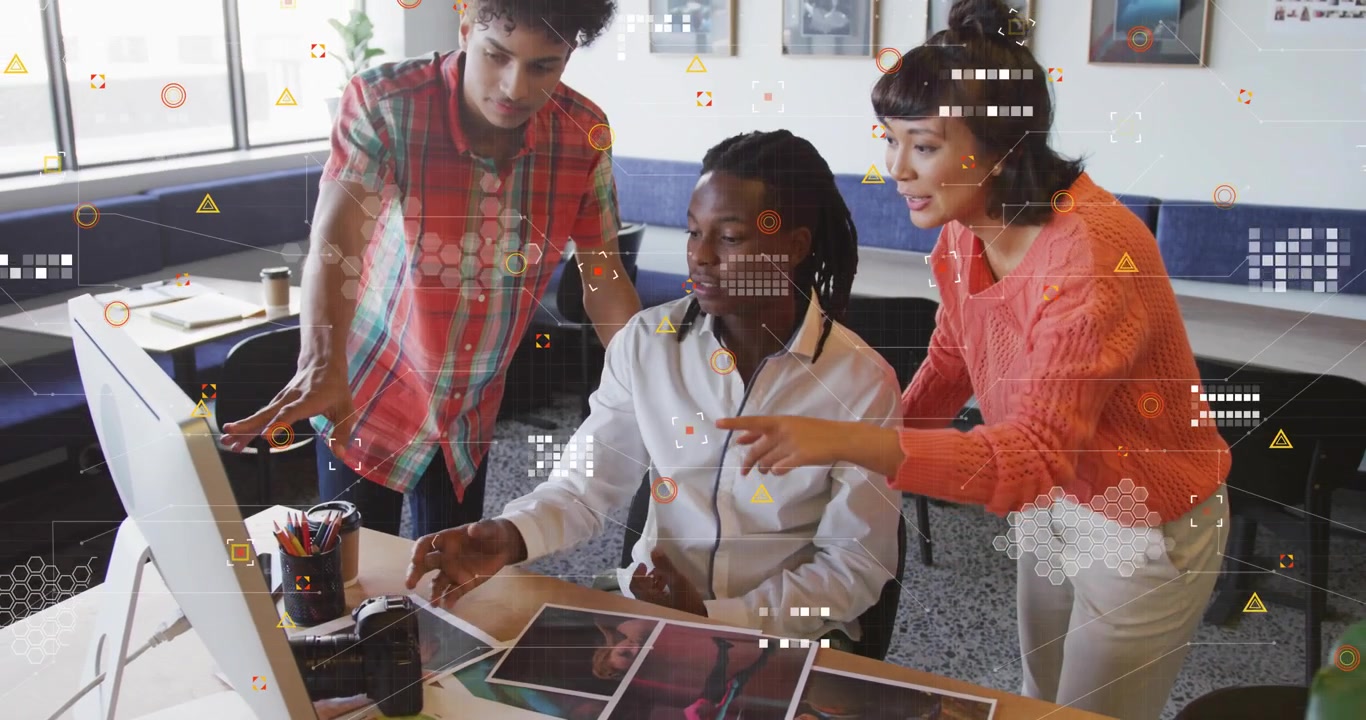 Design team reviewing prints screen seated lead clicking mouse showing hex overlay finalizing pick