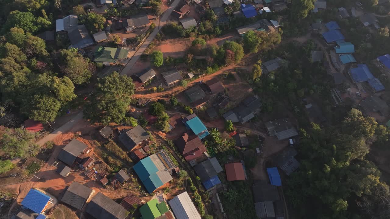 Top-down view of Khun Chang Khian rural hillside huts, Thailand