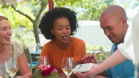 Man-Making-Contactless-Payment-At-Outdoor-Bar-Or-Restaurant-Using-Credit-Or-Debit-Card