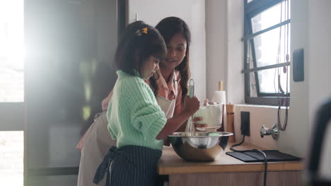 mother and daughter baking together