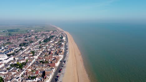 aerial along deal beach seafront in kent with town in view