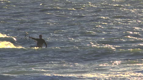 A-wind-surfer-moves-fast-across-the-ocean