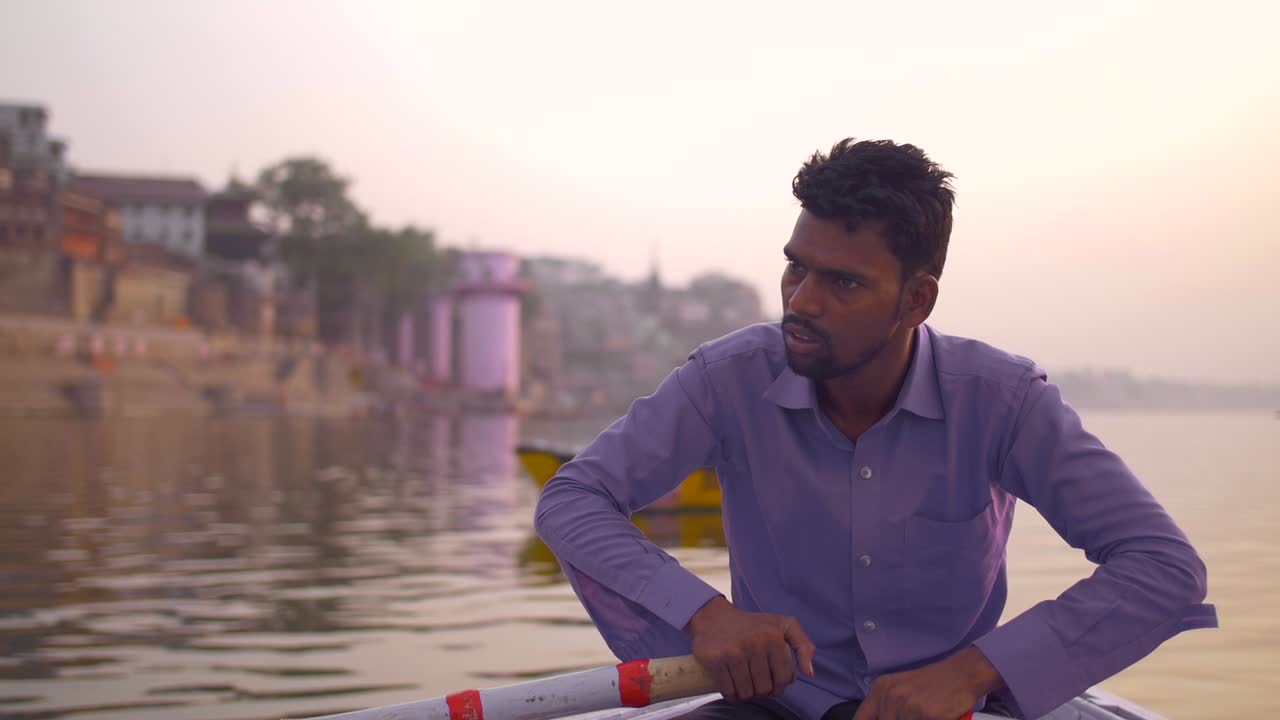 Close-Up of Man Rowing on the Ganges at Sunset