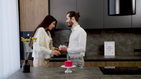 woman opening and hugging gift box