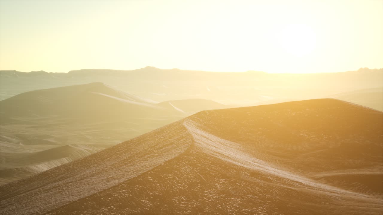 해가 뜨면 사하라 사막 의 큰 모래 언덕 에 대한 공중 전망