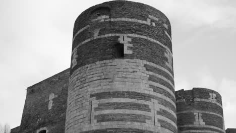 Historic-Medieval-Angers-Castle-In-The-Loire-Valley,-Maine-et-Loire,-France---black-and-white,-close-up