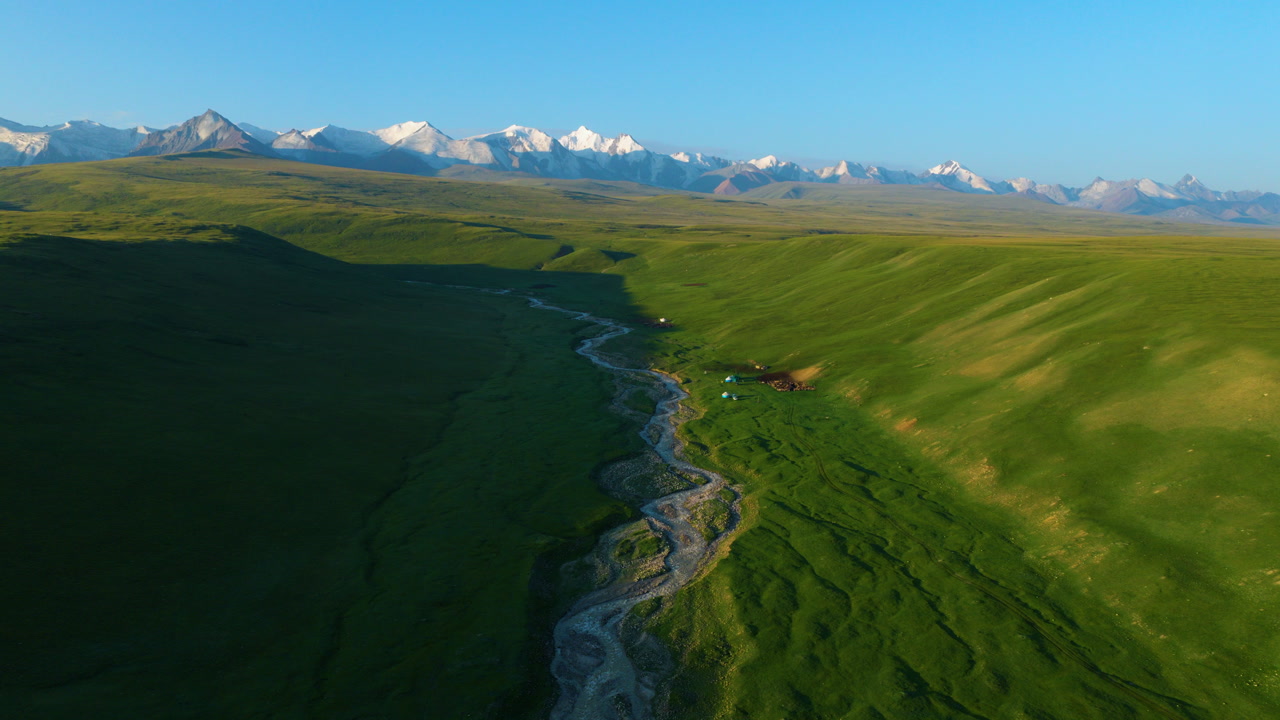 Reveals The Tian Shan Mountains In The Sary-Jaz Valley Near The Border Of Kyrgyzstan and China. Aerial Tilt-up Shot