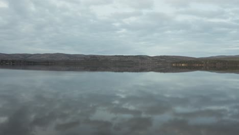 Peaceful-bench-located-on-the-side-of-an-Alaskan-lake